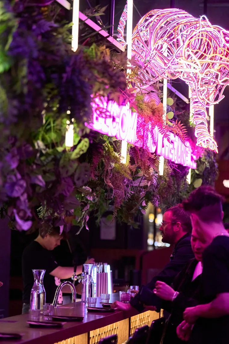 At the neon bar